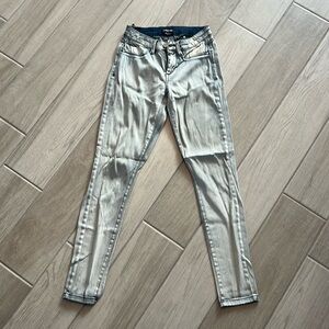 Stretchy jeans that feel like leggings. Size 25. The color is a light blue gray